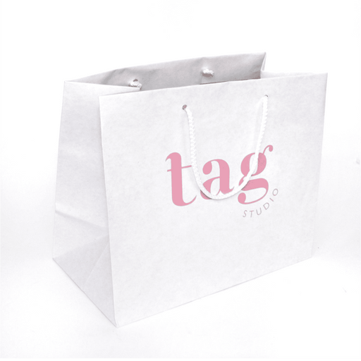 Bolsas de papel granes personalizadas con tu logo o diseño. Bolsas de papel. Bolsas de papel grandes. Mint Pages