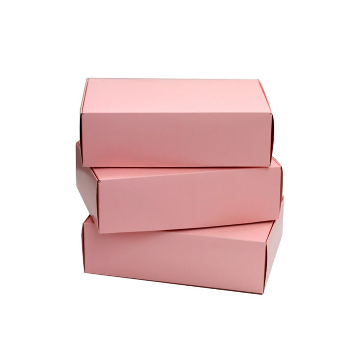 Caja de carton vacia de color Rosa y blanco a rayas